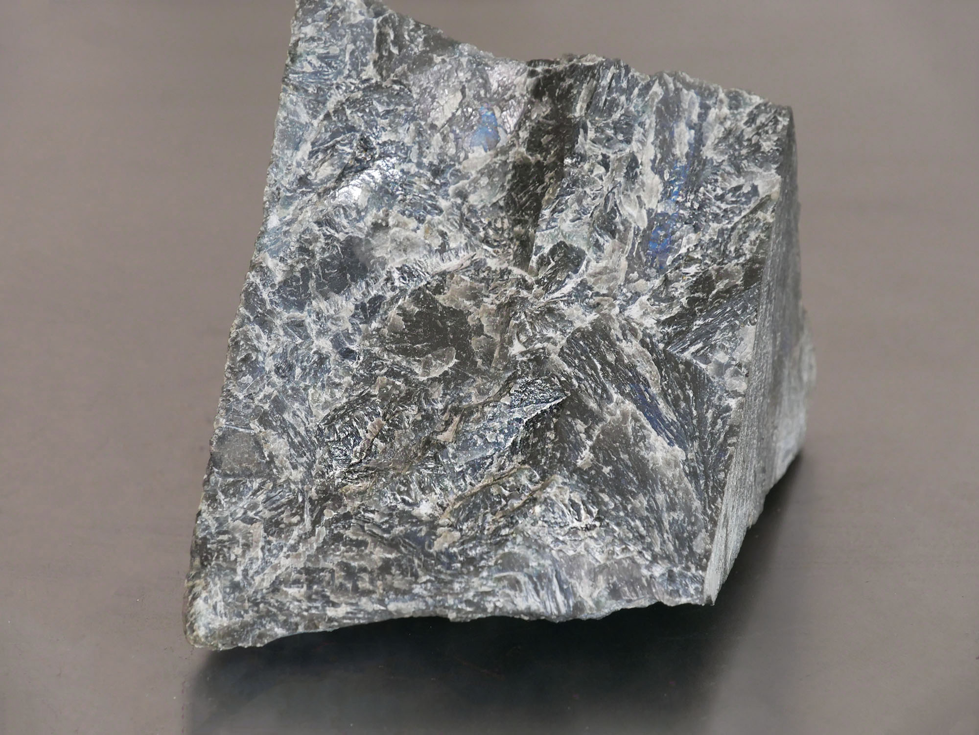 Raw labradorite specimen with blue flashes